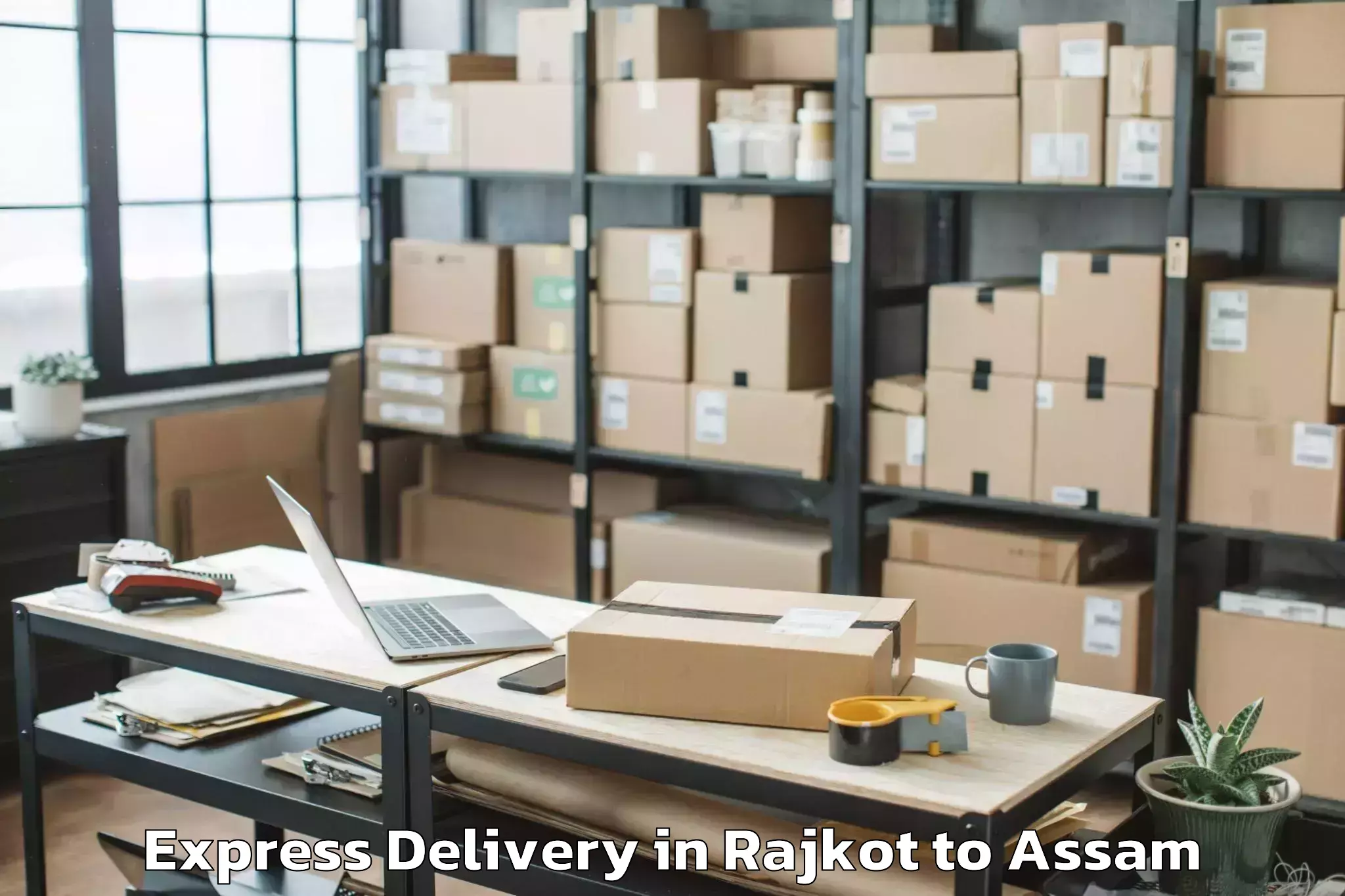 Discover Rajkot to Jonai Express Delivery